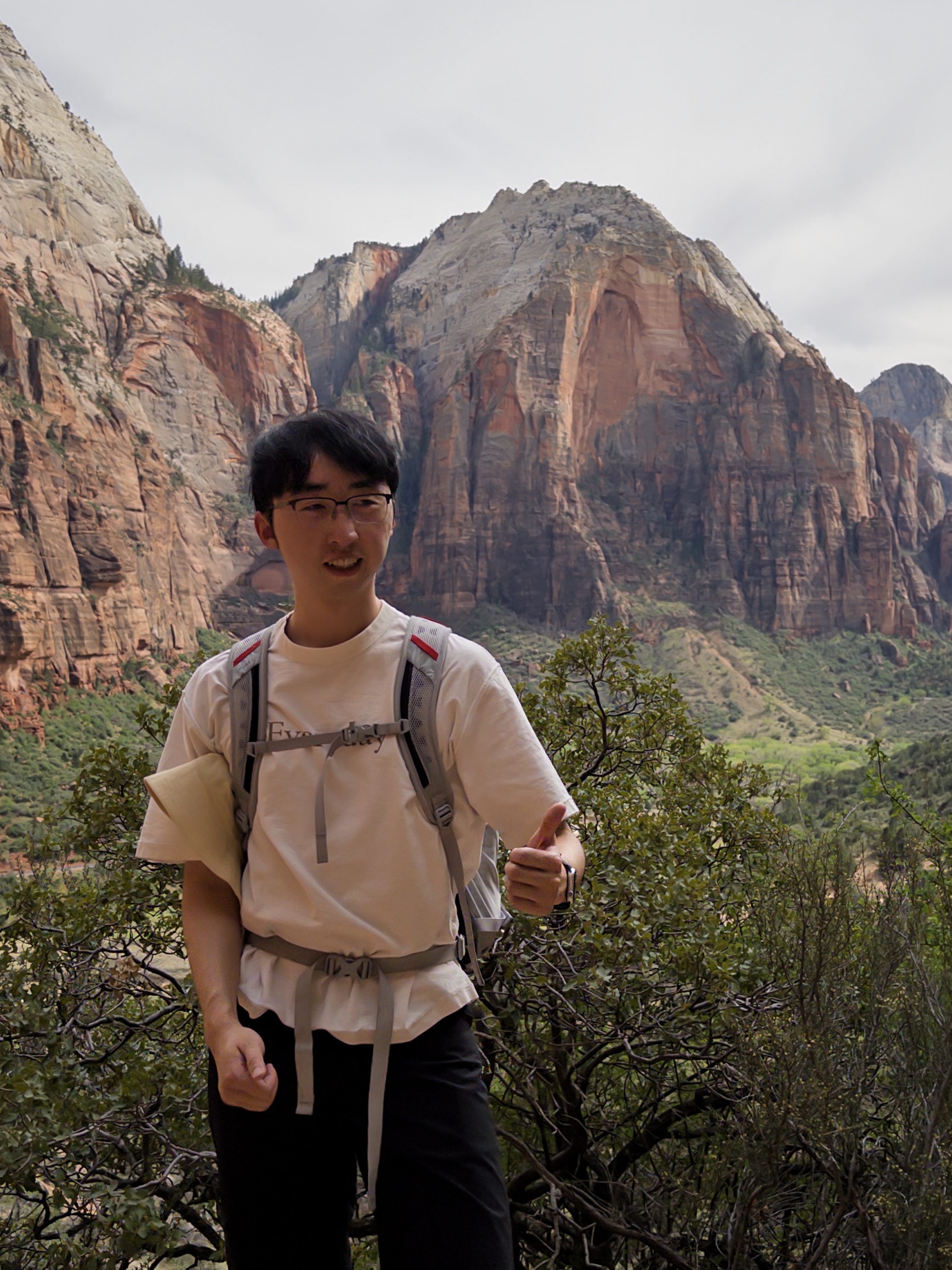Zijie Yan hiking in the mountains